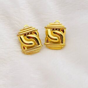 Authentic Givenchy gold tone clip earring